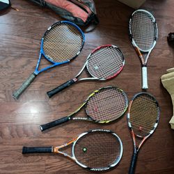 7 tennis rackets along with 2 racket bags 