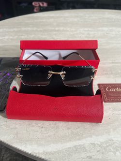 Cartier glasses black and gold