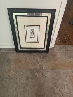 23x 27 black framed perfume bottle