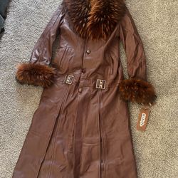 NEW!! Brown leather coat with fur trim and belt details.