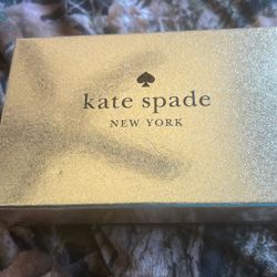 Brand new Kate Spade wallet still in box