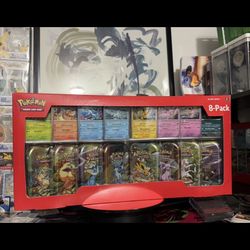 Prismatic evolutions Costco Tin Bundle