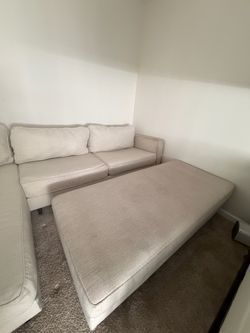 Beige sofa with ottoman
