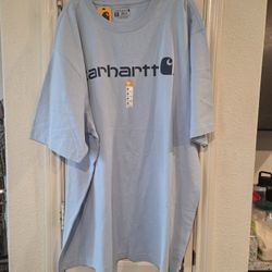 Carhartt K195 Relaxed Fit Heavyweight Short-Sleeve Logo Graphic T-Shirt in the color Fog Blue. 