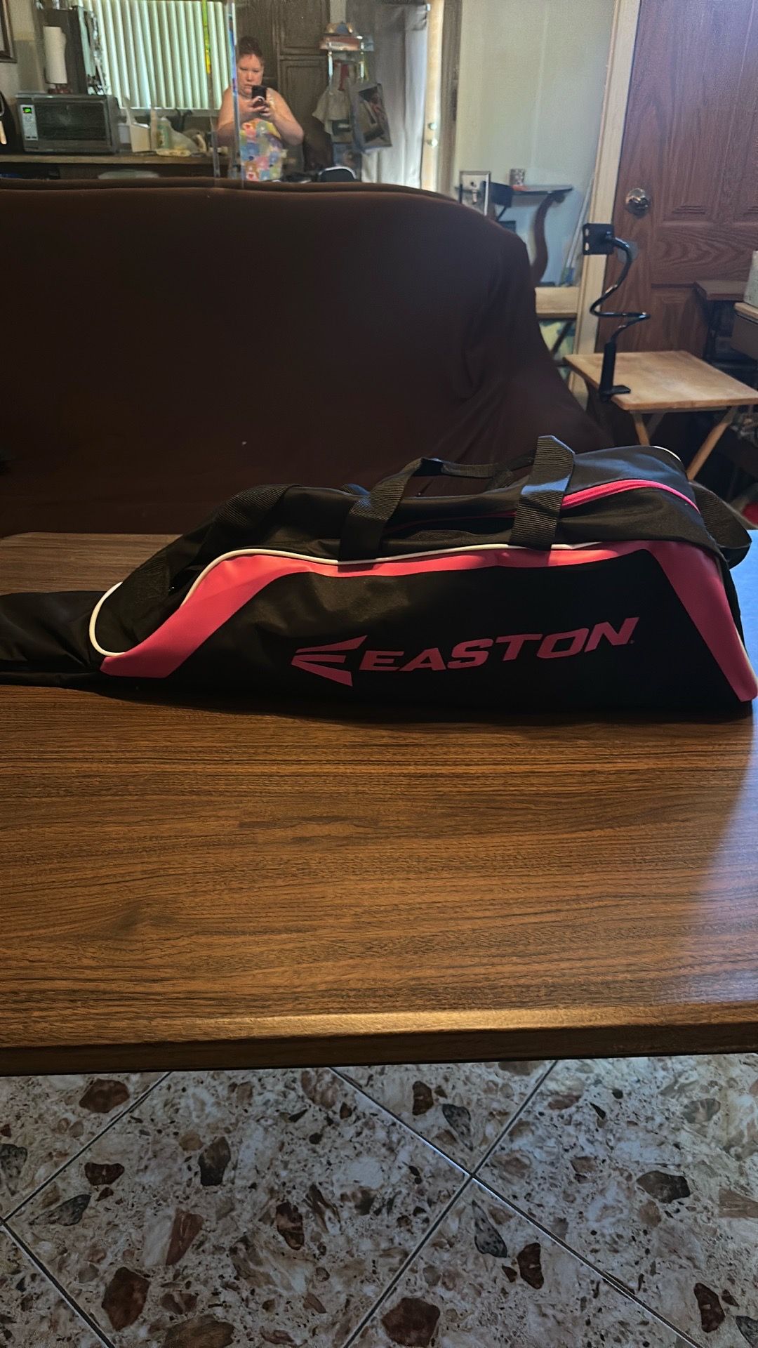 Easton softball bag with bat,balls,and batters gloves