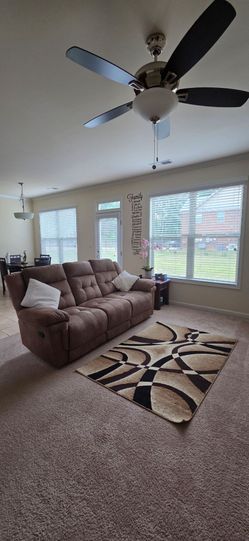 Reclining Sofa with corner table and matching rug