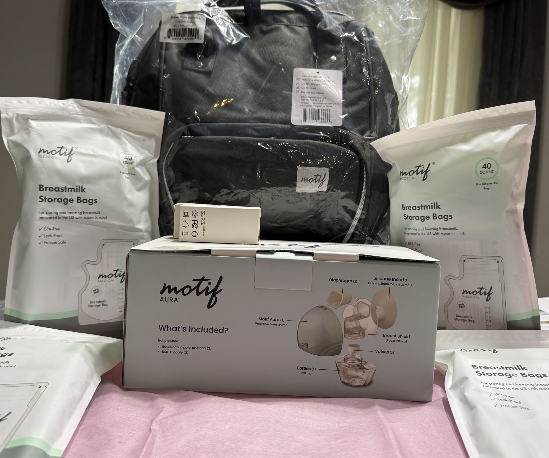 New Motif Aura Breast Pump Kit & breast milk storage bags & breast pump backpack. Motif Aura Breast Pump Kit
