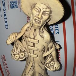 11" vintage Hard resin figurine of Chinese man carrying fruit 1962