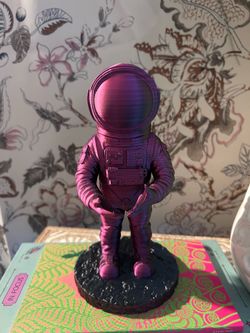Space man golf ball display (pink/black)