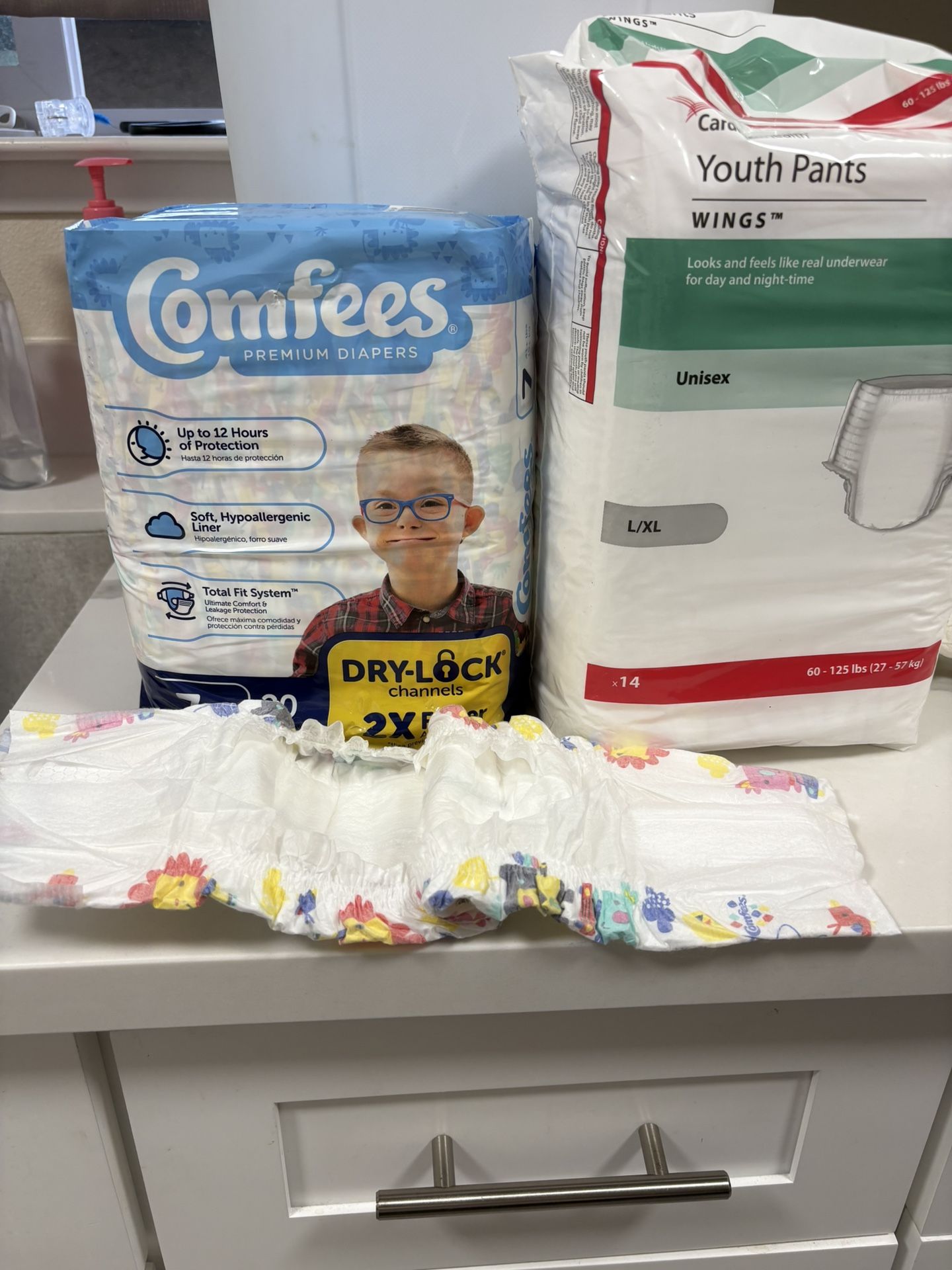 I have a lot of regular comfy diapers size 7, but literally my son that was like 3 months he was fitting them and they don’t pee through  at All 