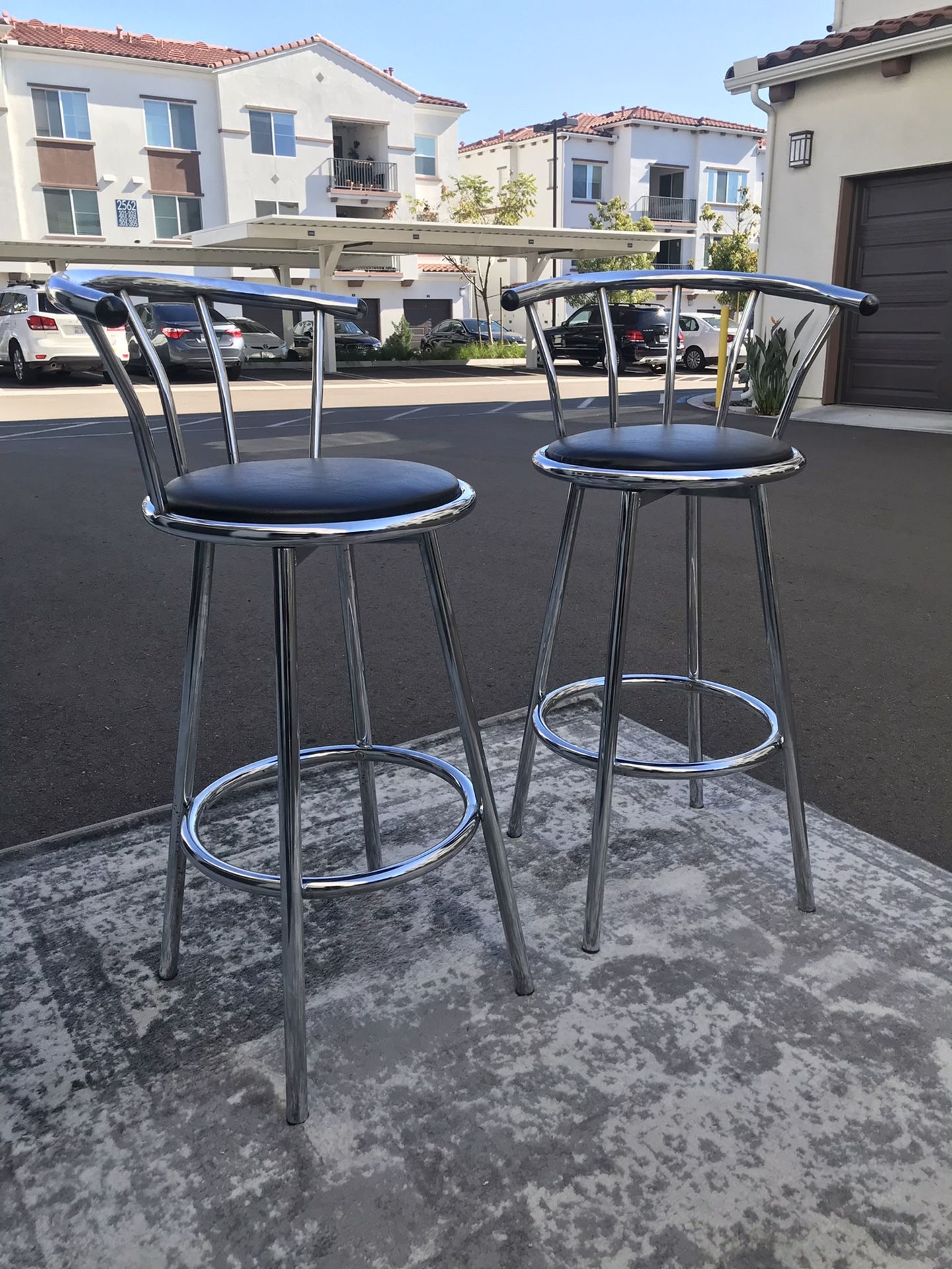 2 barstools with chrome and black leather (price for both)