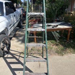 Used aluminum man 6 foot ladder still works