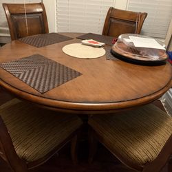 solid wood table and chairs 