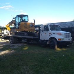 Turnkey 2009 Peterbilt Truck With Flatbed, Caterpillar Excavator And Bobcat