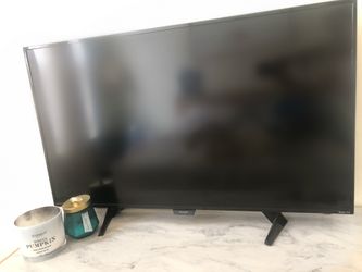 Roku TV with wires and remote
