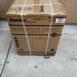 Danby Mini Fridge New $90 / Medium Size Needs Work New Asking $30 