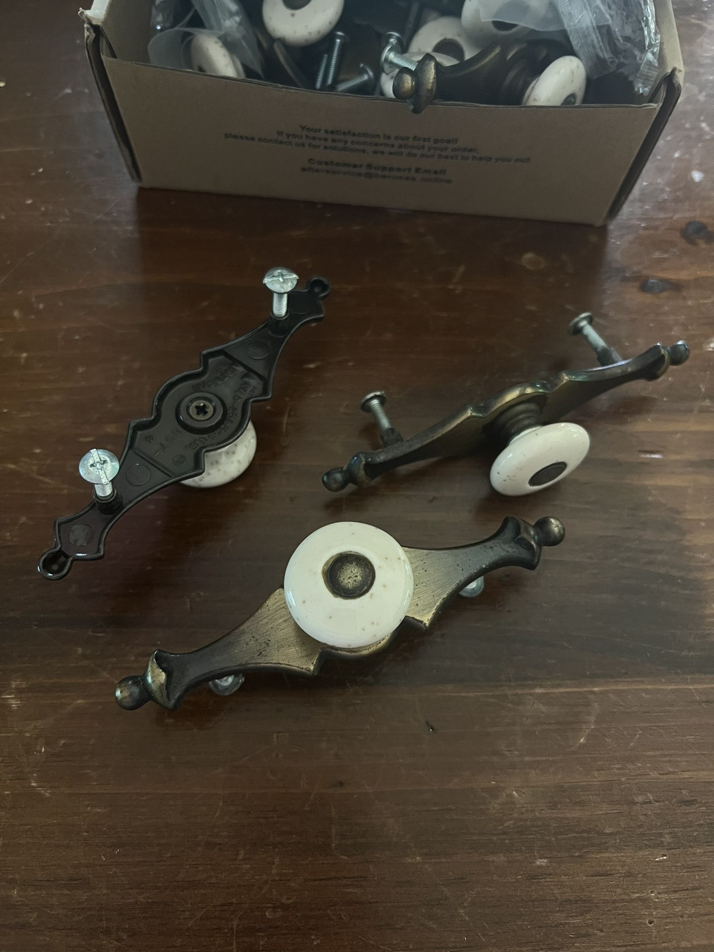 vintage bronze cabinet pulls with a porcelain knob