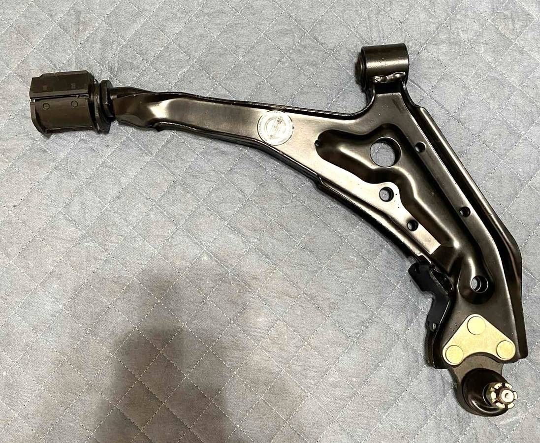 Nissan 54500-85E11 Arm Assembly – Lower (Passenger Side)