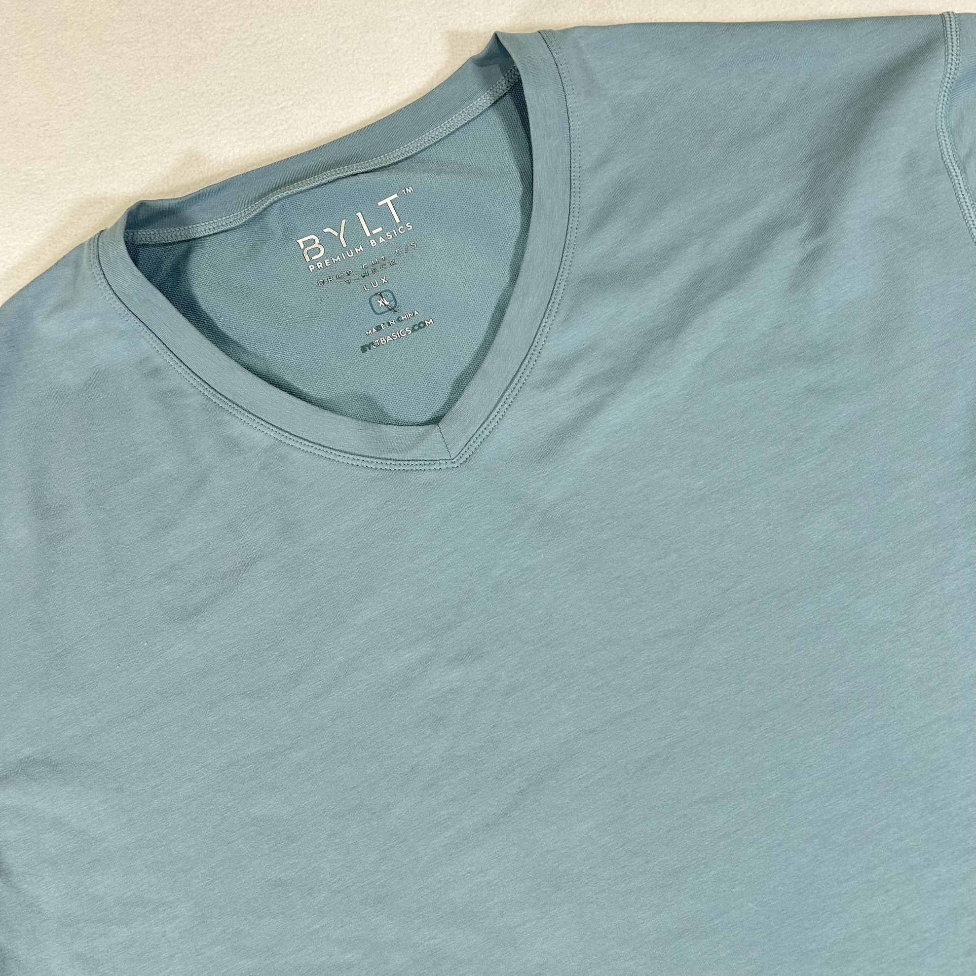 BYLT Drop Cut Lux Shirt Mens Sz XL Blue Short Sleeve V Neck Curved Hem