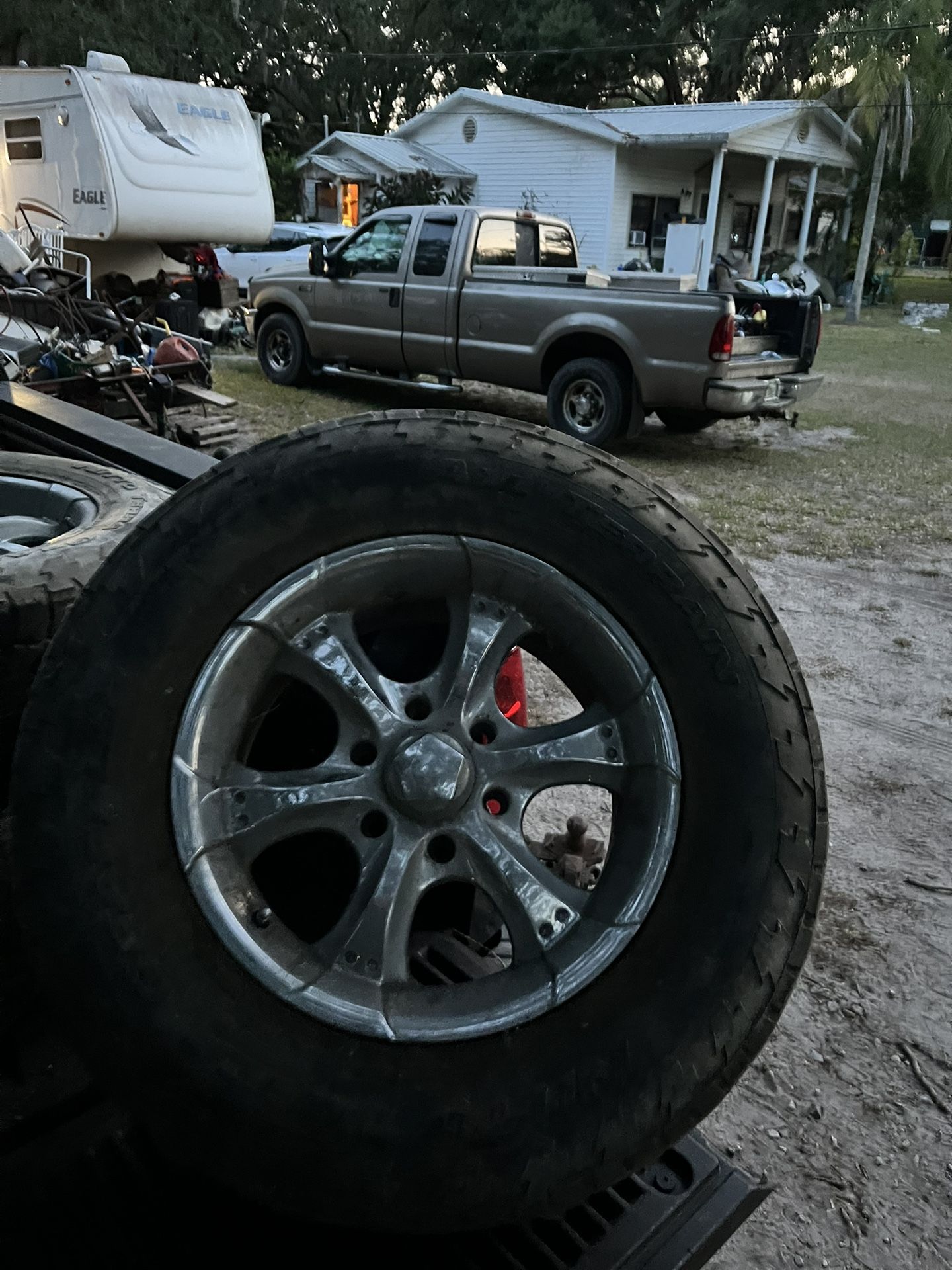 Six lug 17 inch rims with three good tires