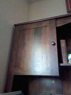 Brown desk with hunch