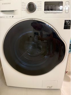 Samsung stackable washer/dryer like new.