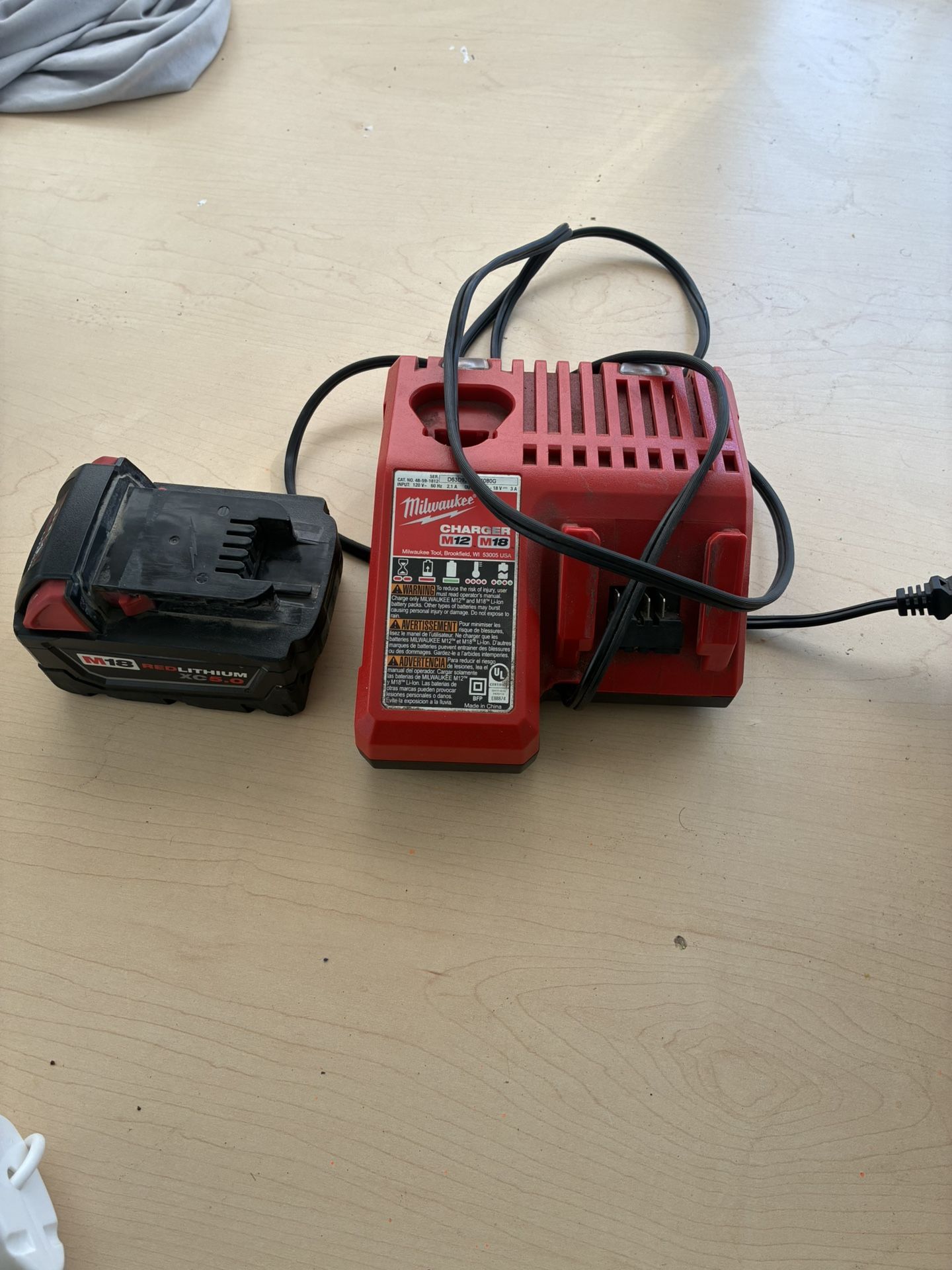Milwaukee Battery And Charger