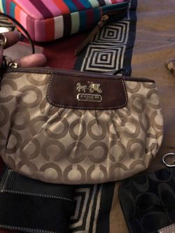 Large coach wrist wallet color khaki