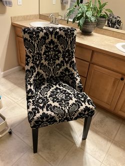 Two tapestry accent chairs