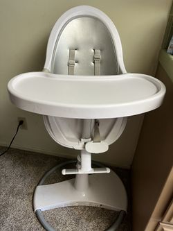 Reclining Height Adjusting High Chair.