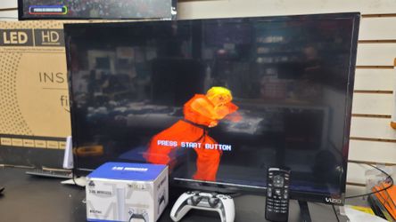 Combo. Juego de 2 controles + TV vizio 33"