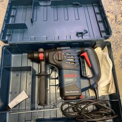 Bosch 8 Amp 1-1/8 in. Corded Variable Speed SDS-Plus Concrete/Masonry Rotary Hammer Drill with Depth Gauge and Carrying Case 