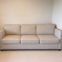 Sofa with memory foam mattress upholstered