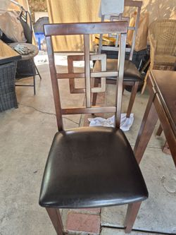 Table and four chairs 48 x 36