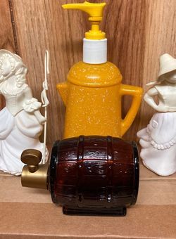 Four Retired Avon Decanters (Empty)