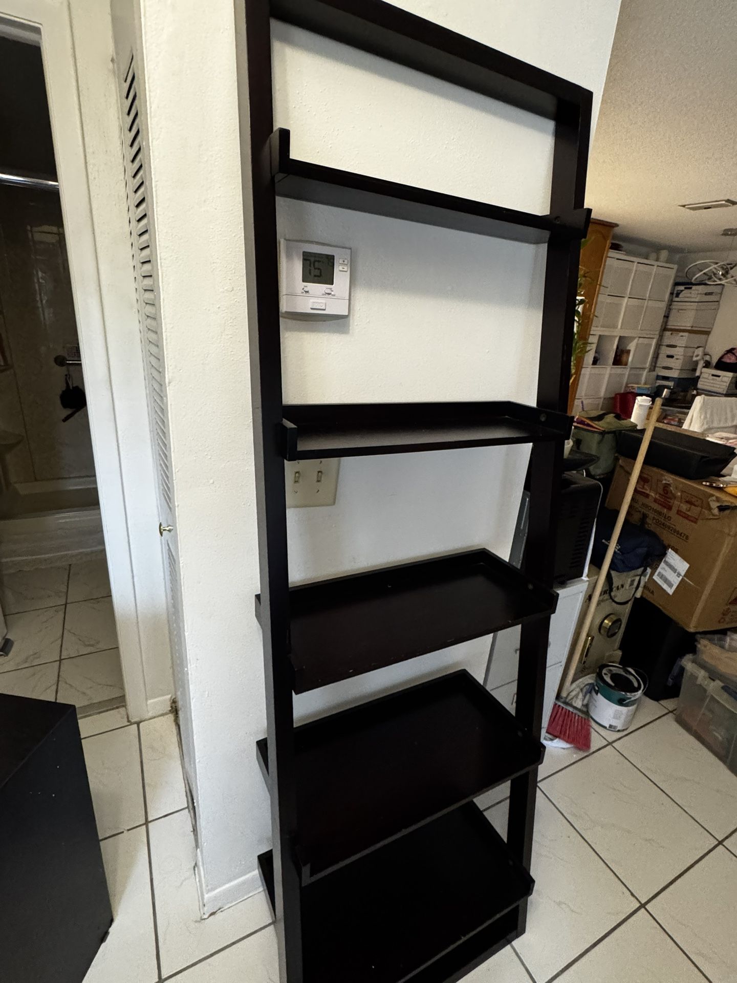 wooden ladder-shaped shelf. 76 “ High and 25 1/2” of Width . Good Condition.