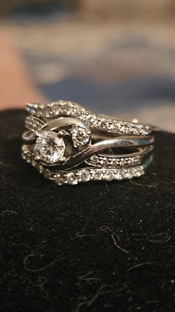 Kay Jewelers wedding ring 3/8 carat center piece plus enhancer size 5.