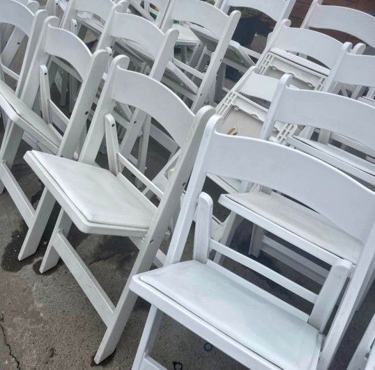 White RESIN folding Chairs