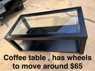 Coffee table with wheels $65 Firm price !