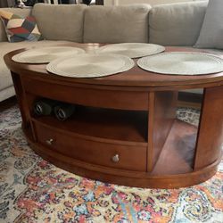 Oval Wood Coffee Table – Solid, Functional, Well-Worn Top