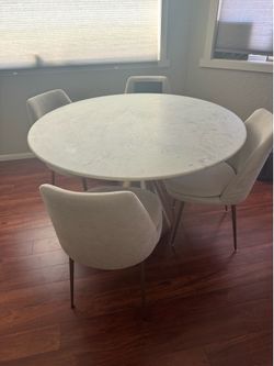 West Elm dining room table and chairs
