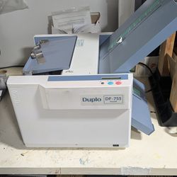 Duplo paper folding machine