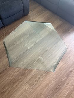 Sculptural triangular bent glass cocktail table