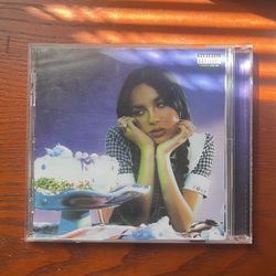 Taylor Swift and Olivia Rodrigo CDs