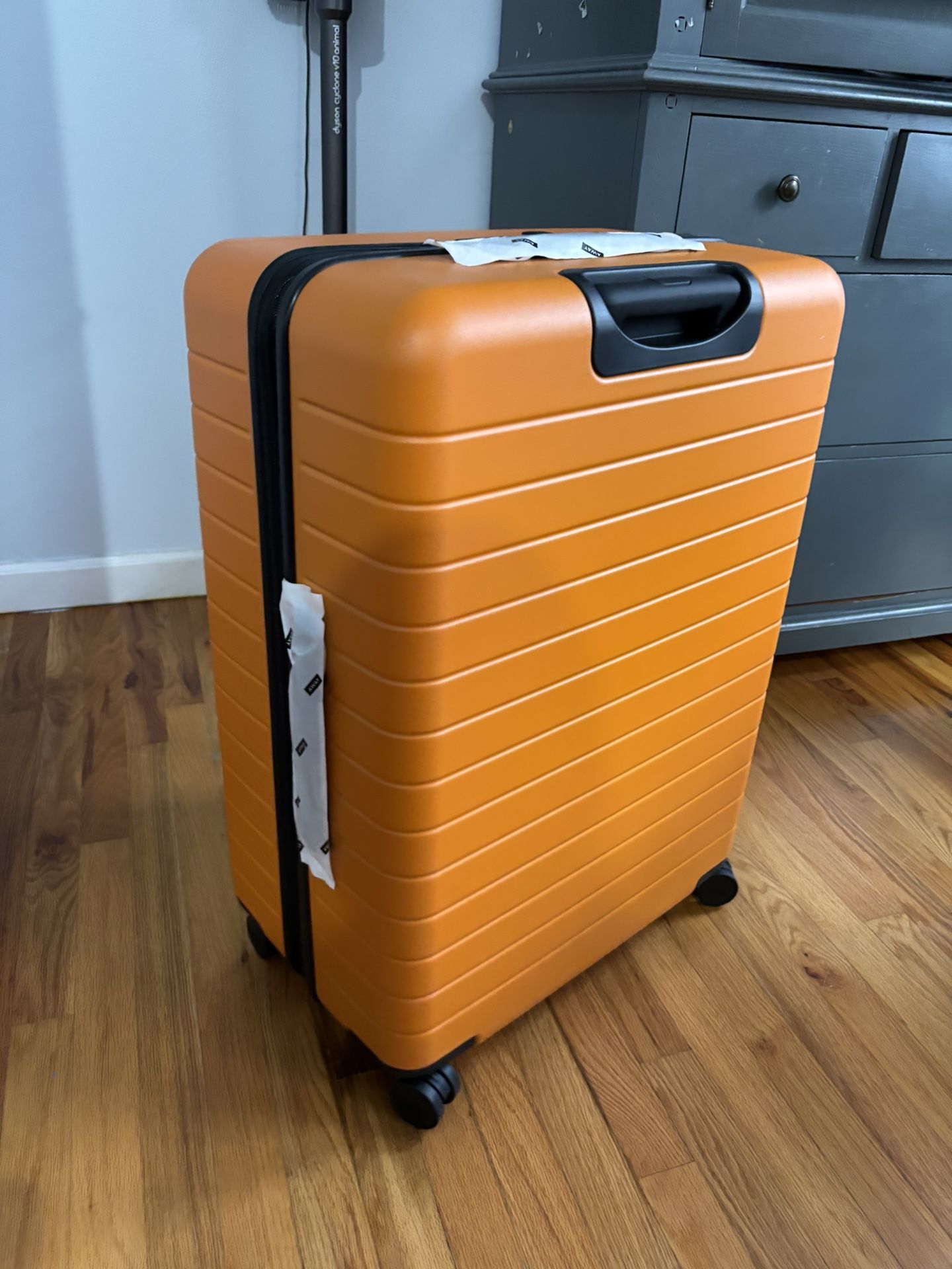 Away Suitcase The Large Flex Sorbet Orange