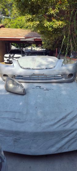 2002,2003,2004,2005,2006 nissan altima front bumper and headlights