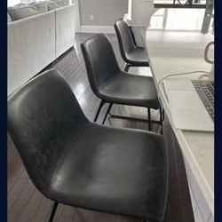 Three Counter height Chairs
