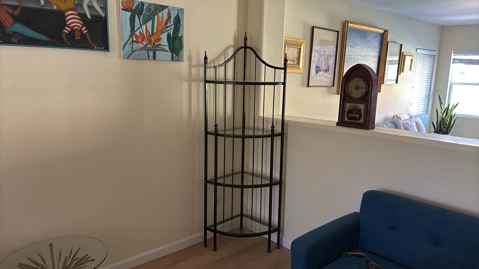 corner shelving unit with glass shelves
