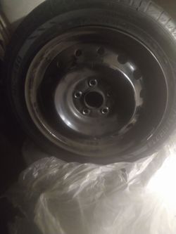 4 used tires with rims