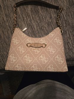 GUESS Monogrammed shoulder bag.